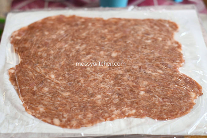 Use A Rolling Pin To Flatten The Minced Pork Mixture